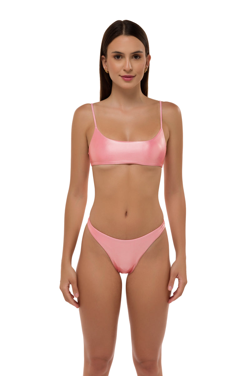Model in pink metallic sporty kin