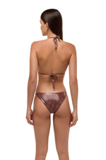 Model in brown metallic bikini top
